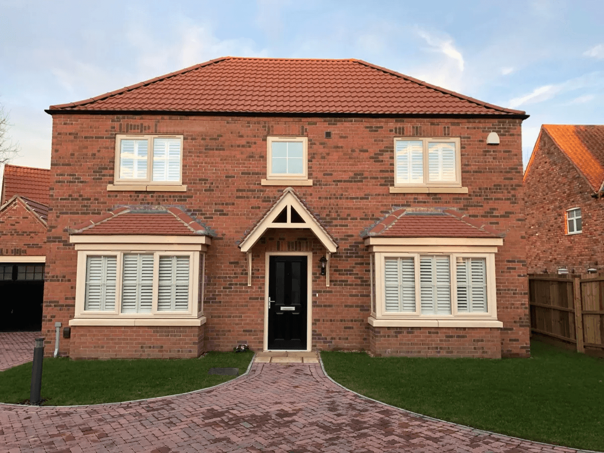 Exterior view of York home with plantation shutters